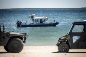 A police boat just off the beach in Ipswich, Massachusetts.